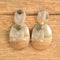 Audrey Schenk Earrings Sterling silver oval disc drop earrings on wood background