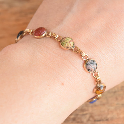 vintage scarab bracelet displayed on light skinned wrist