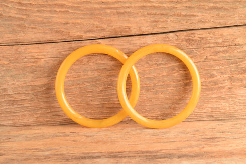 Pair of Yellow Bakelite Bangles