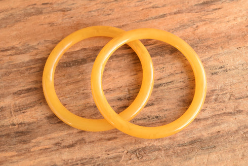 Pair of Yellow Bakelite Bangles
