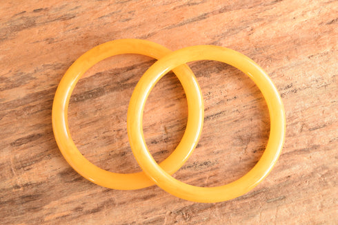 Pair of Yellow Bakelite Bangles