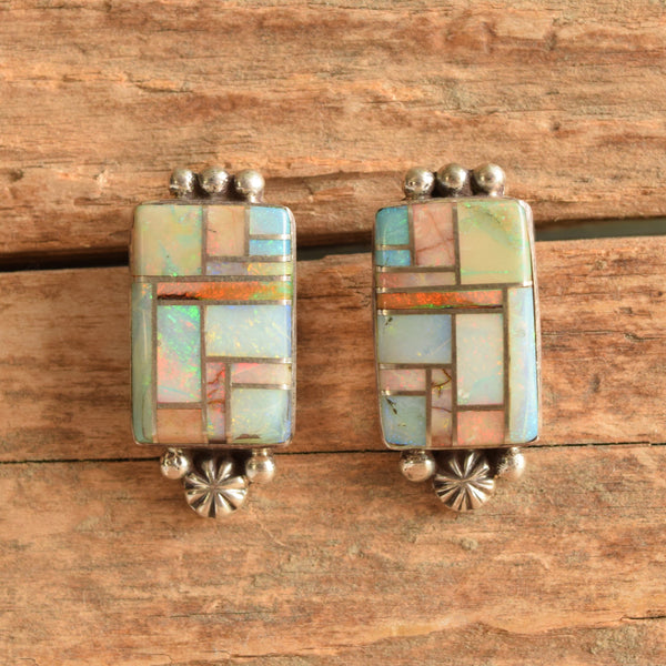 Rectangle Opal Inlay Native American Earrings on wooden background.