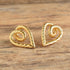 Gold toned twisted rope chunky heart earrings on wood