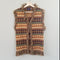 1970's Brown and tan Fringe edge sweater vest on hanger