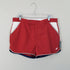 Rust red shorts with terry cotton details