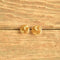 Infinity knot stud earrings gold toned