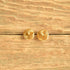 Infinity knot stud earrings gold toned