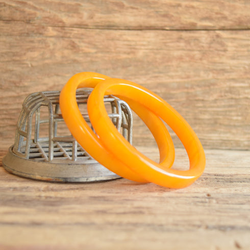 Pair of Marbled Bakelite Bangle Bracelets Yellow