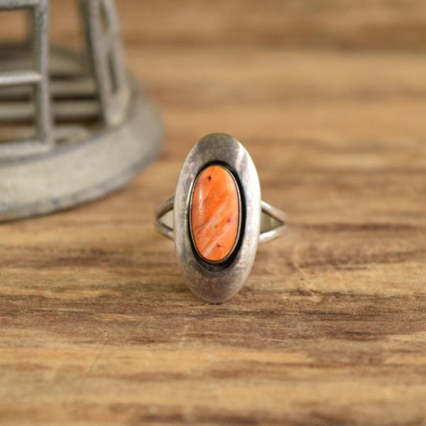 Orange Spiny oyster Native American Ring on wood