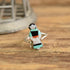 corn maiden Zuni inlay ring - size 9. On wood background with flower frog