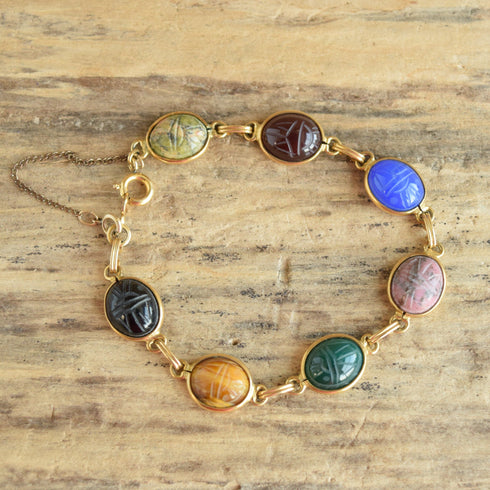 50's gold filled scarab bracelet gemstones on wood