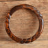 Carved Brown Marbled Bakelite Bangle