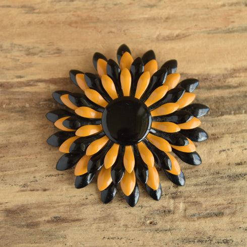 black and tan flower brooch