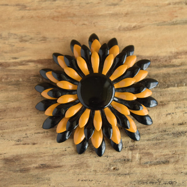 black and tan flower brooch