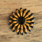black and tan flower brooch
