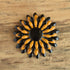 black and tan flower brooch