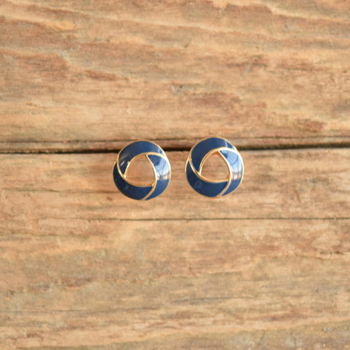 blue knot earrings vintage displayed in wood