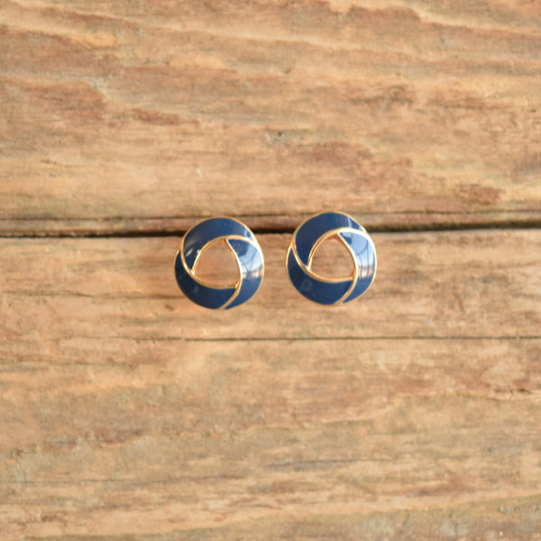blue knot earrings vintage displayed in wood
