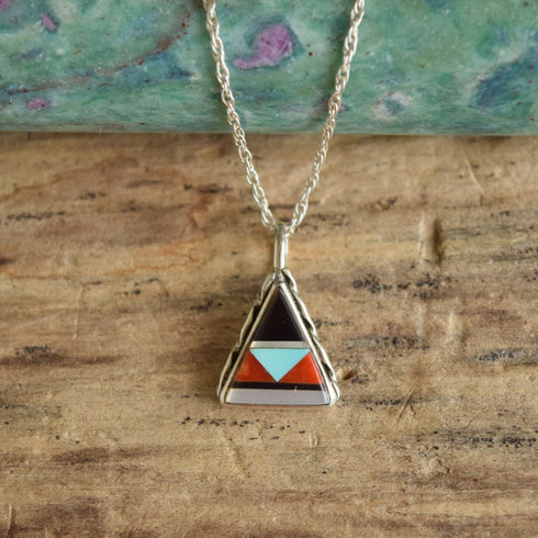 Vintage triangle inlay silver pendant necklace on wood