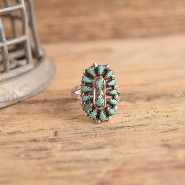 Turquoise Petit Point Sterling Silver Ring on wood