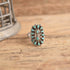 Turquoise Petit Point Sterling Silver Ring on wood