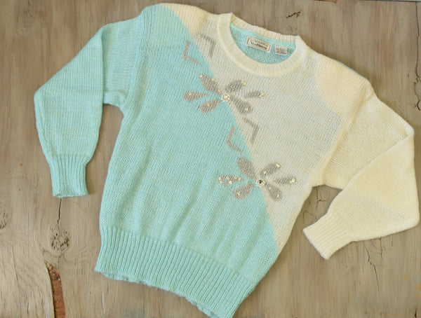 blue, silver and white 1980's sweater