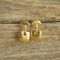 Gold toned modern square earrings