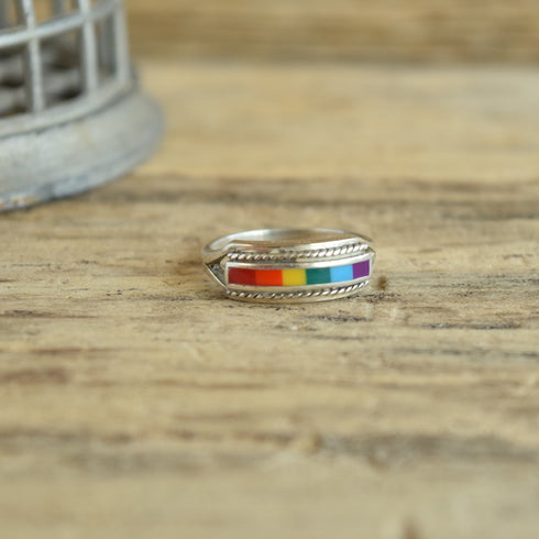 Peter Stone PSCL Rainbow Inlay Ring on Wood