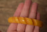 Yellow Carved Bakelite Bangle