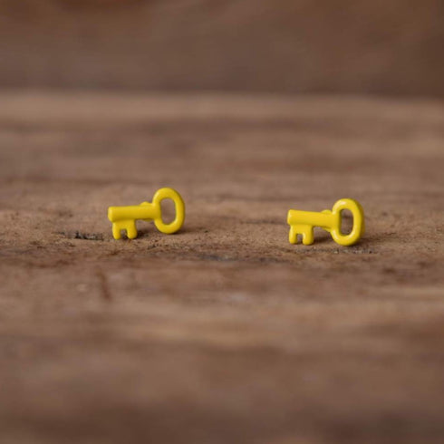 Small yellow key earrings