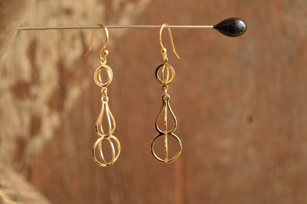 Open work Gold Toned Earrings
