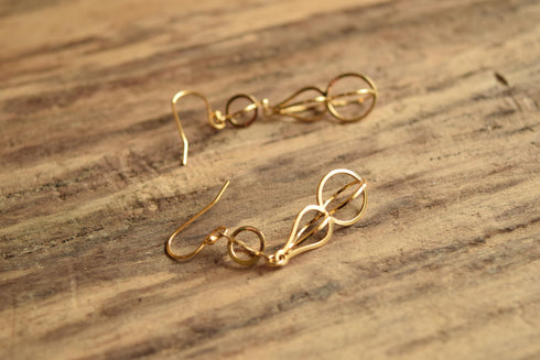 Open work Gold Toned Earrings