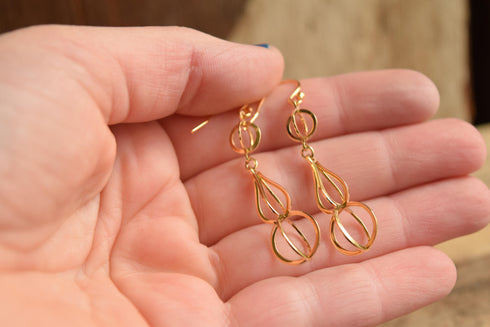Open work Gold Toned Earrings
