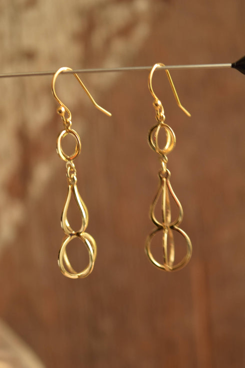 Open work Gold Toned Earrings