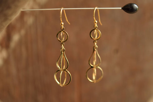 Open work Gold Toned Earrings