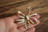 White & Golden Bow Brooch - Vintage Crown Trifari