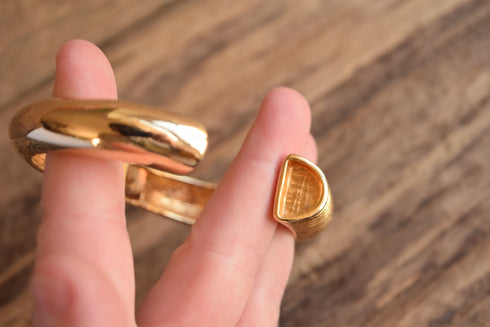 Gold Toned Hinged Bracelet - Vintage CastleCliff