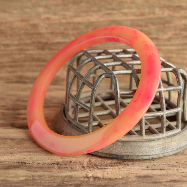 Pink Flying Saucer Tequila Sunrise Bakelite Bangle